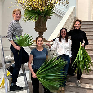 NOTG members install floral arrangements at the New Orleans Museum of Art